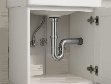 Illustration d’un siphon de lavabo moderne sous une vasque de salle de bain. L’image met en avant une installation propre, compacte et facile à entretenir.