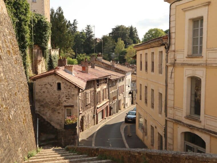 a car is parked on the side of a street